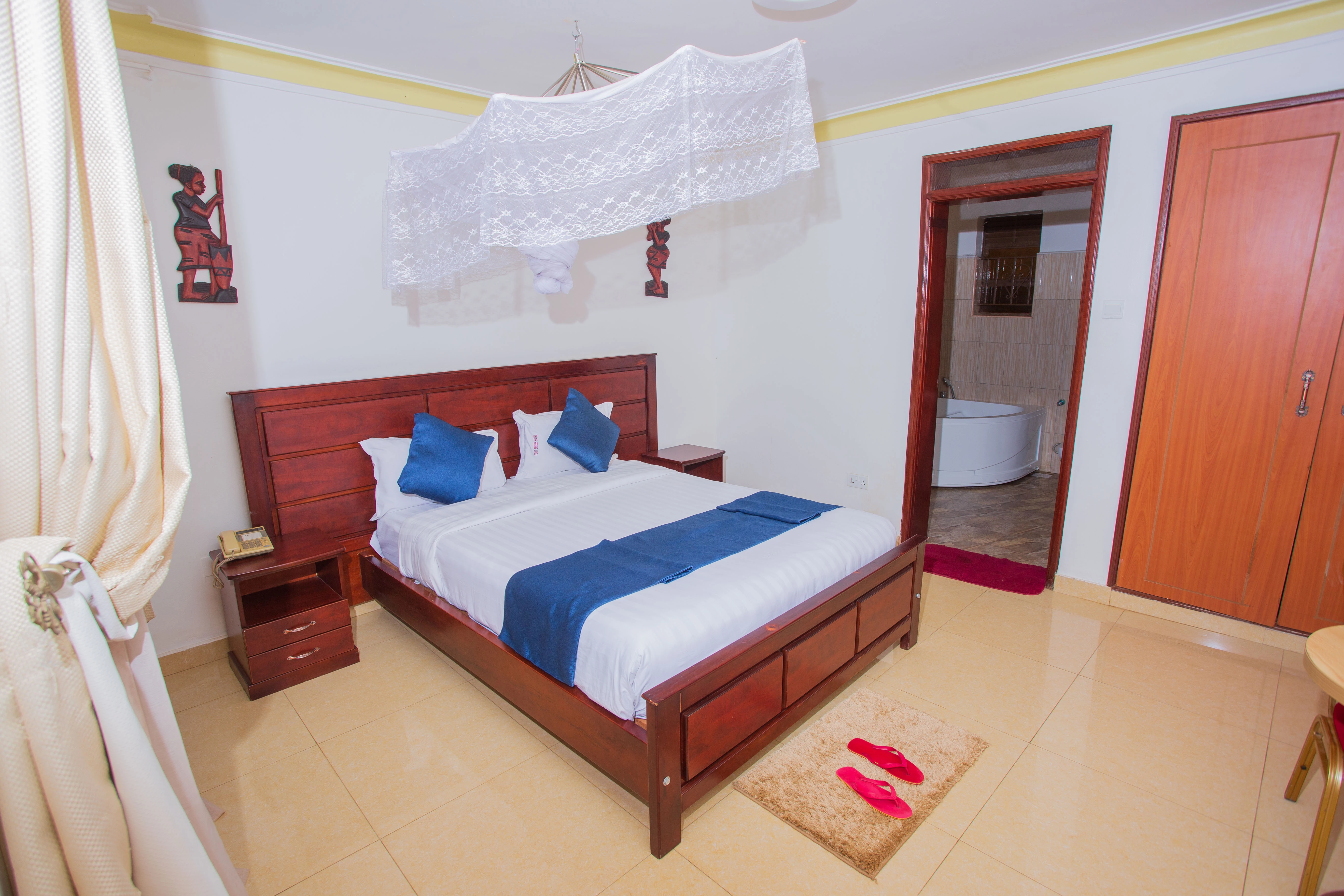Comfortable room with view at FortBreeze Hotel Fort Portal
